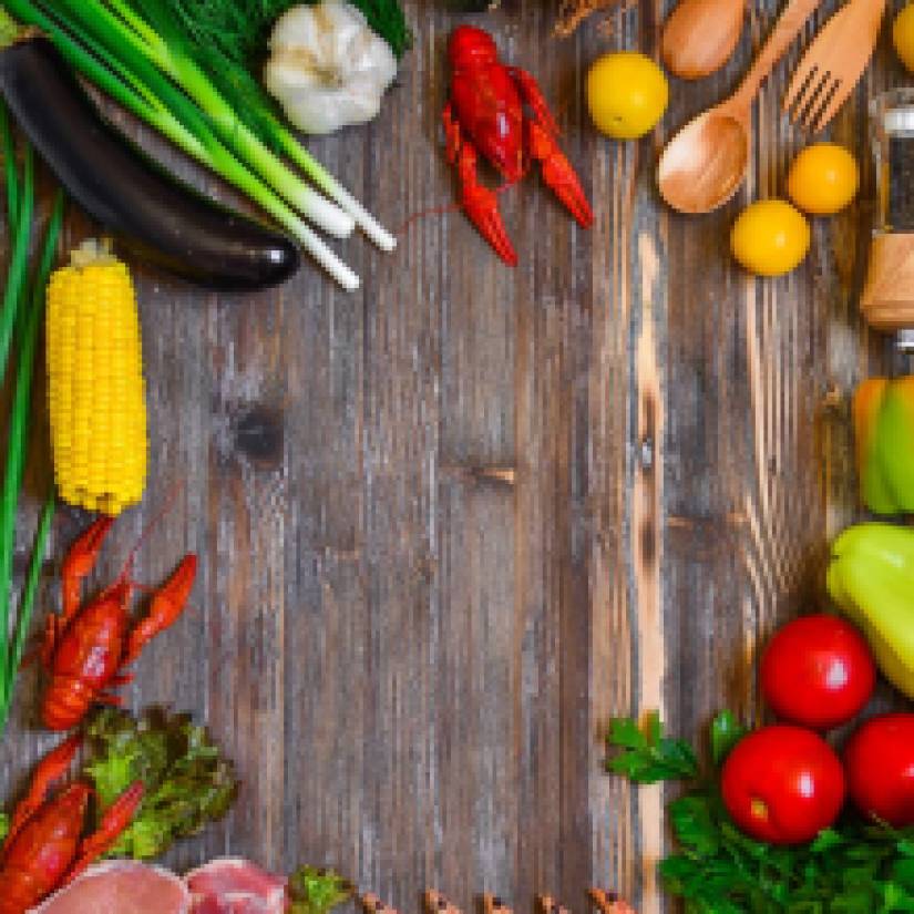 vegetables and tomatoes on cutting board